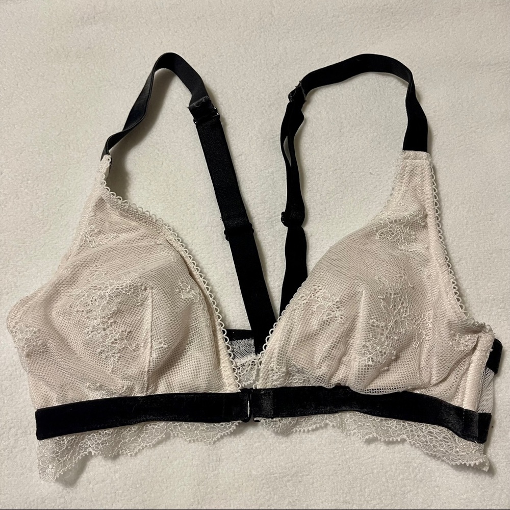 Cream and black lightly lined bra